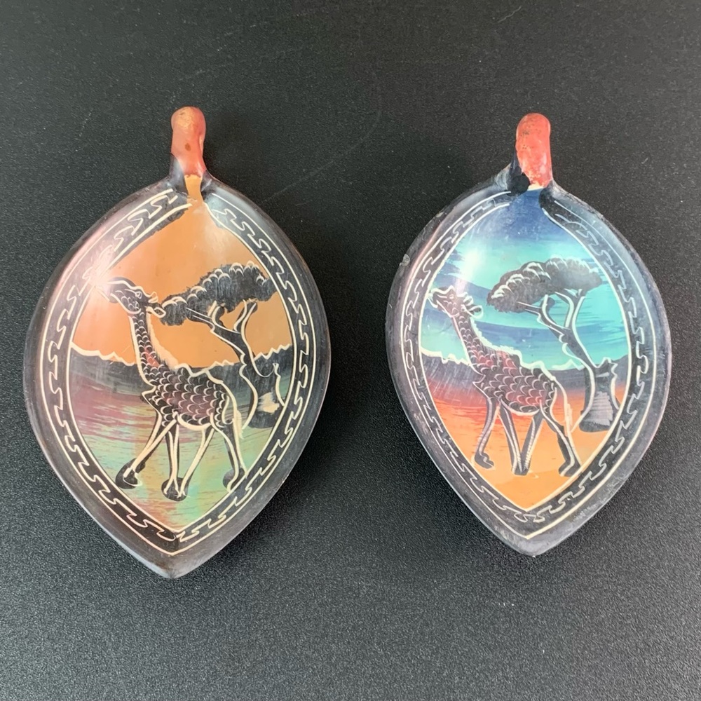 A pair of African Giraffe shallow dishes.